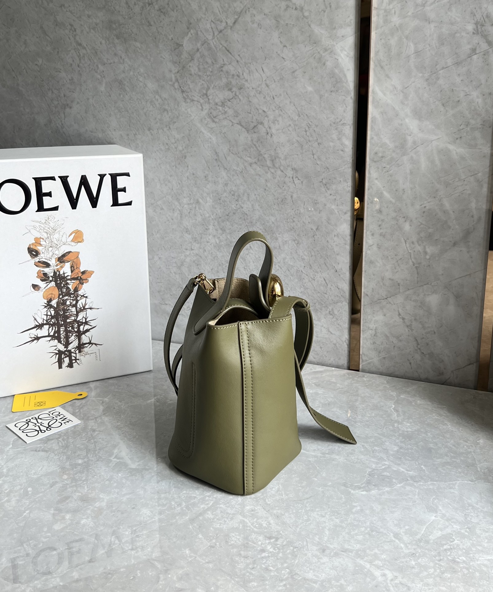 Loewe Mini Pebble Bucket in Mellow Calfskin Green